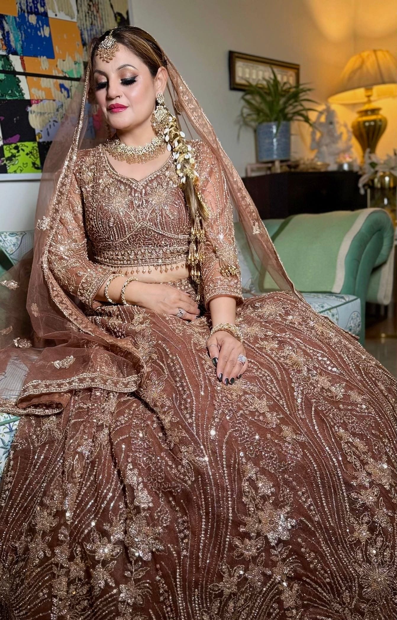 bride in brown lehanga