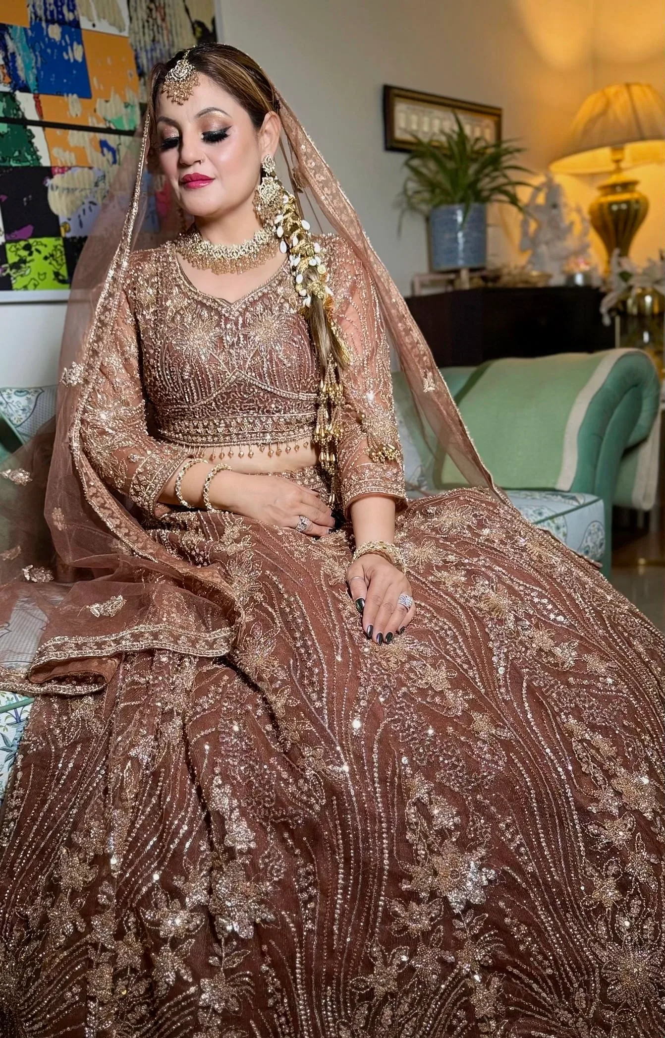 bride in brown lehanga